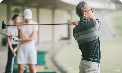 Elderly couple riding bicycles