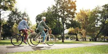 Graphic of elderly couple riding bicycles